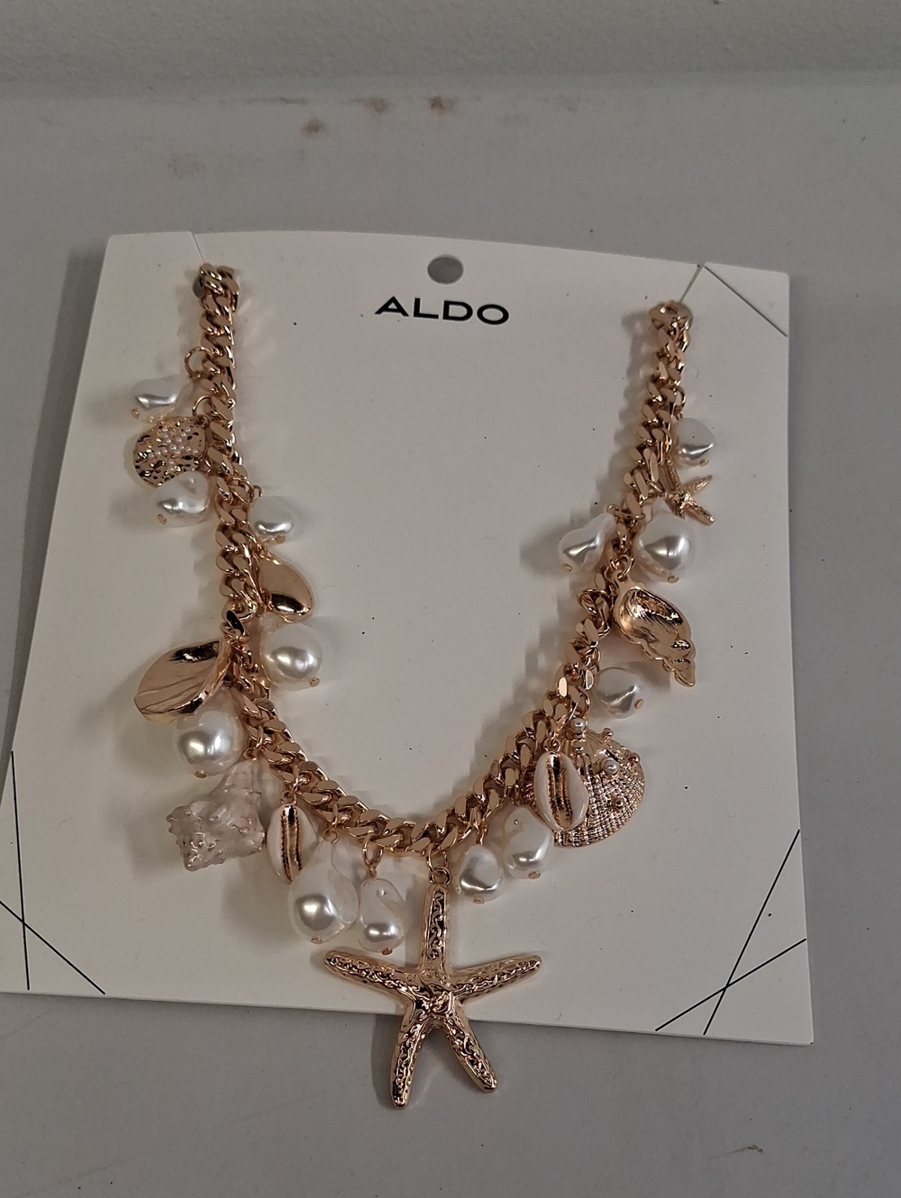 NWT ALDO Gold and Pearl Charm Starfish Necklace